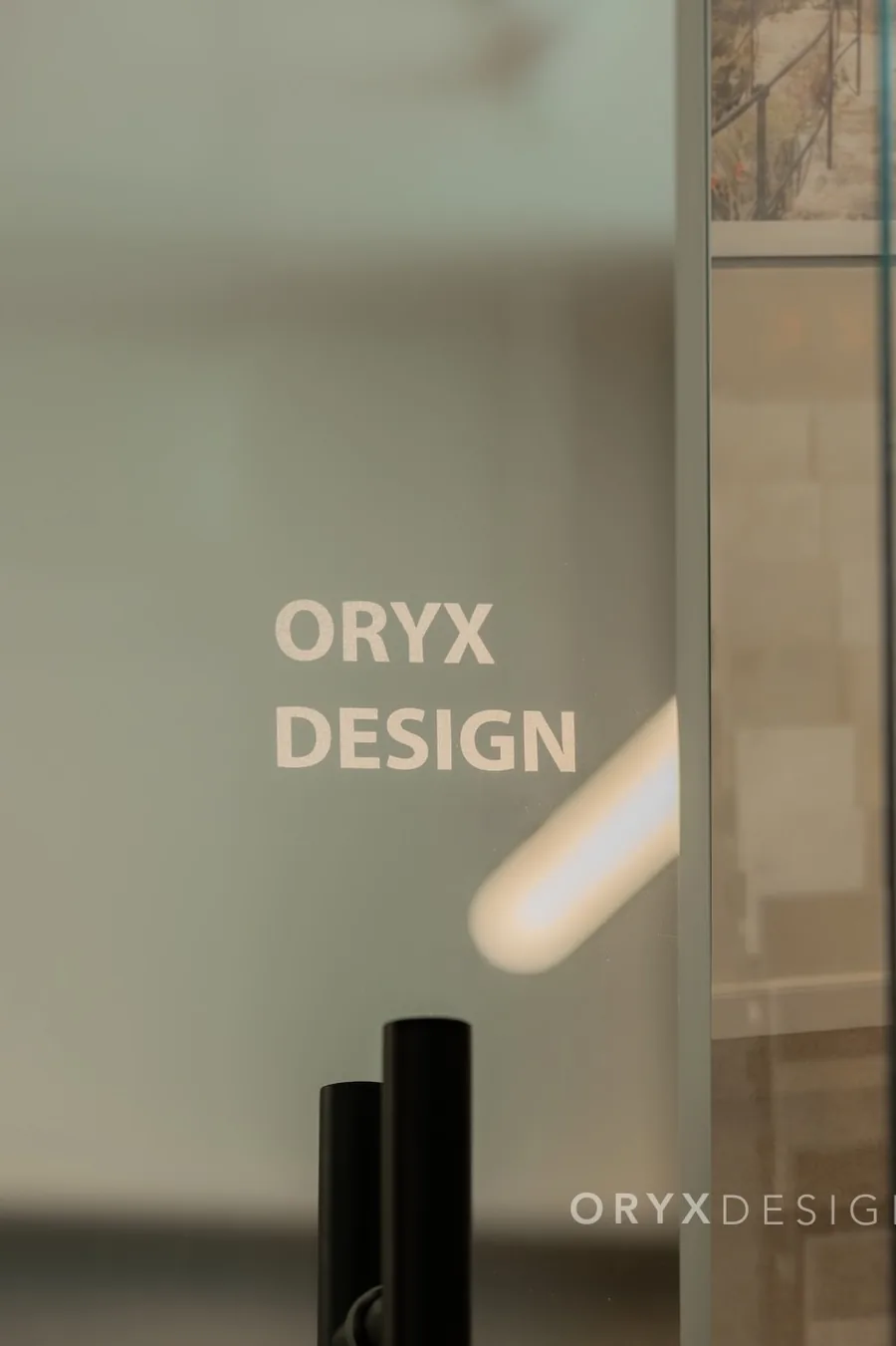 The Oryx Design office in Dubai, the ORYX DESIGN name on the glass partition